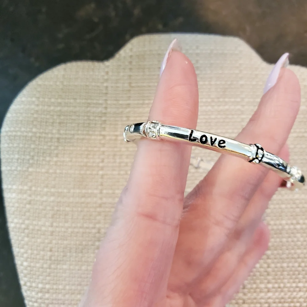 Set of 2 silvertone elastic bangles w/ pastel rhinestone details, love, hearts